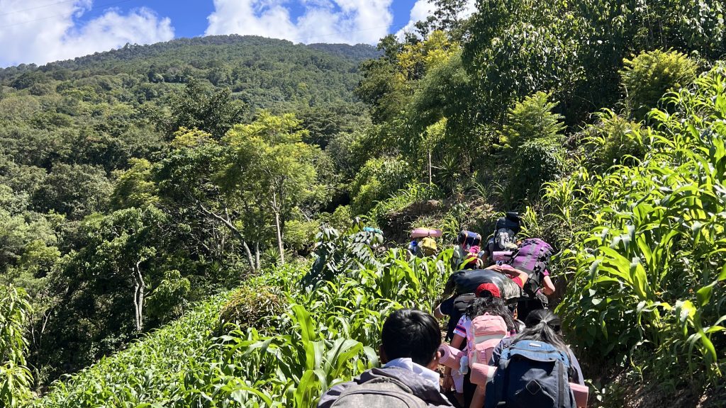 Group hiking around Lake Atitlán retreat Guatemala